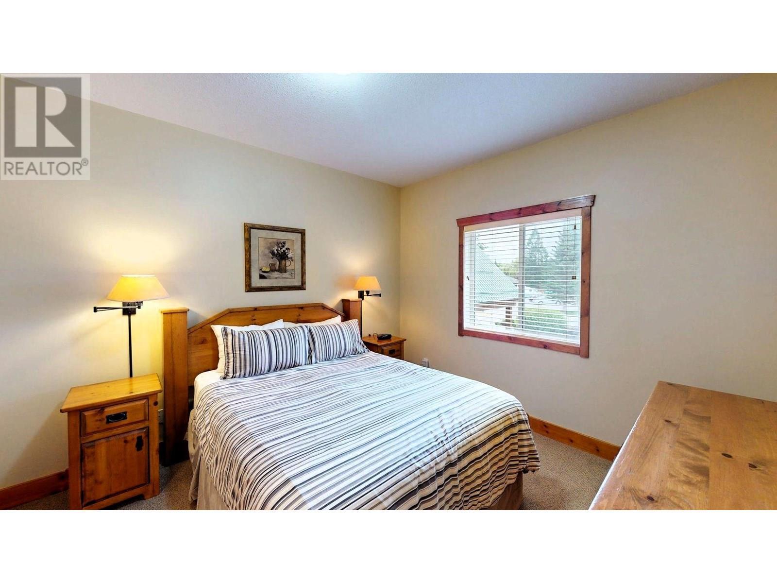 701 14A Crescent Unit# 213 I, Invermere, BC - Indoor Photo Showing Bedroom