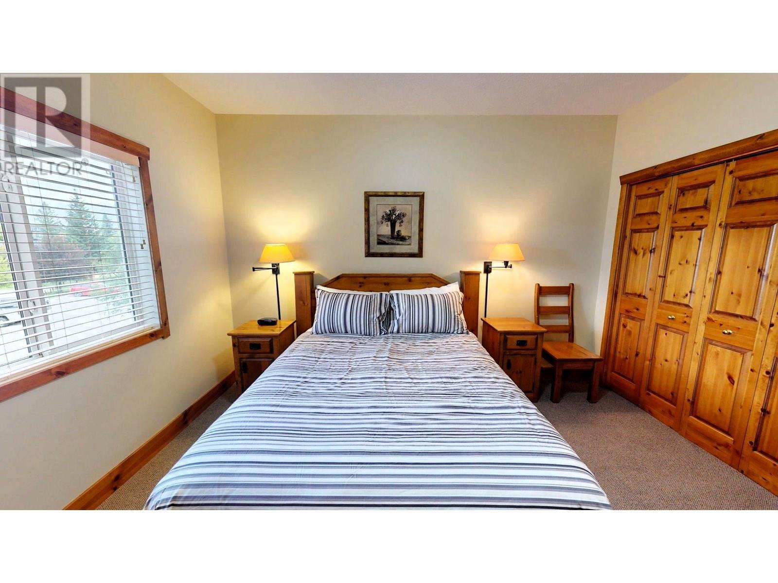 701 14A Crescent Unit# 213 I, Invermere, BC - Indoor Photo Showing Bedroom