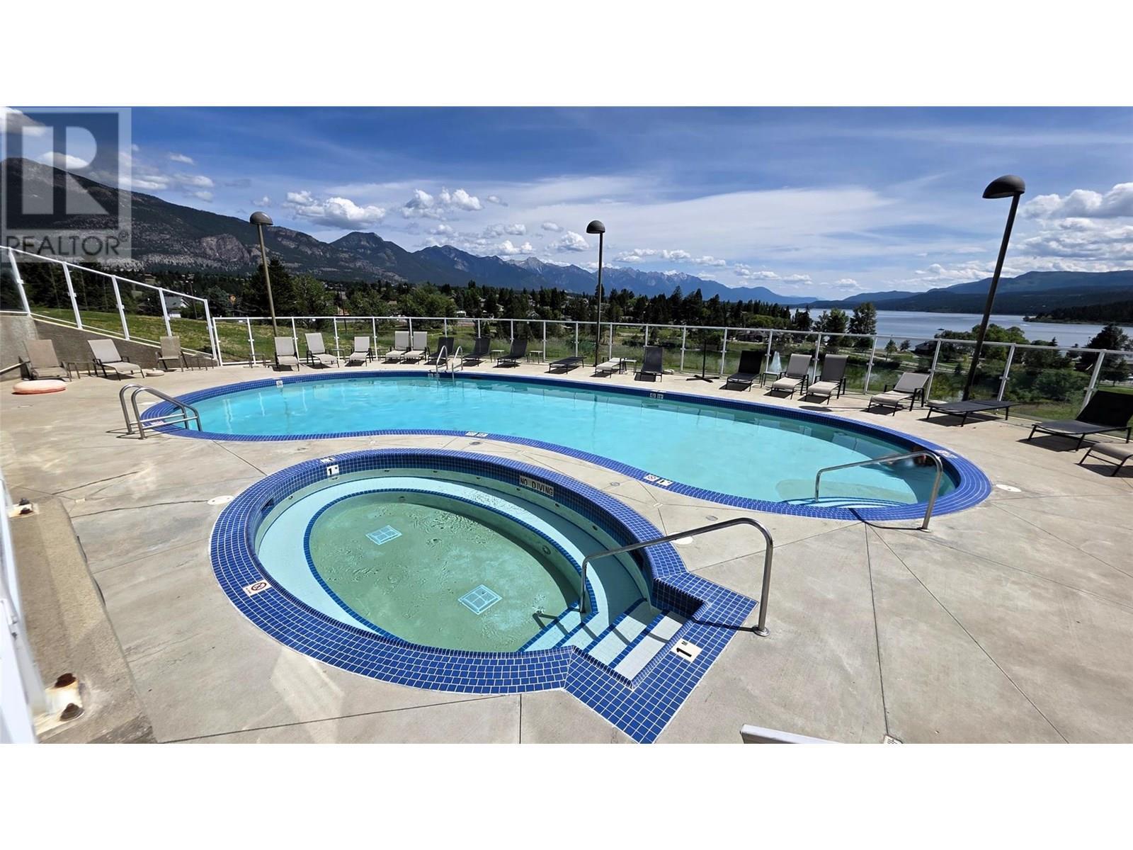 701 14A Crescent Unit# 213 I, Invermere, BC - Outdoor With In Ground Pool