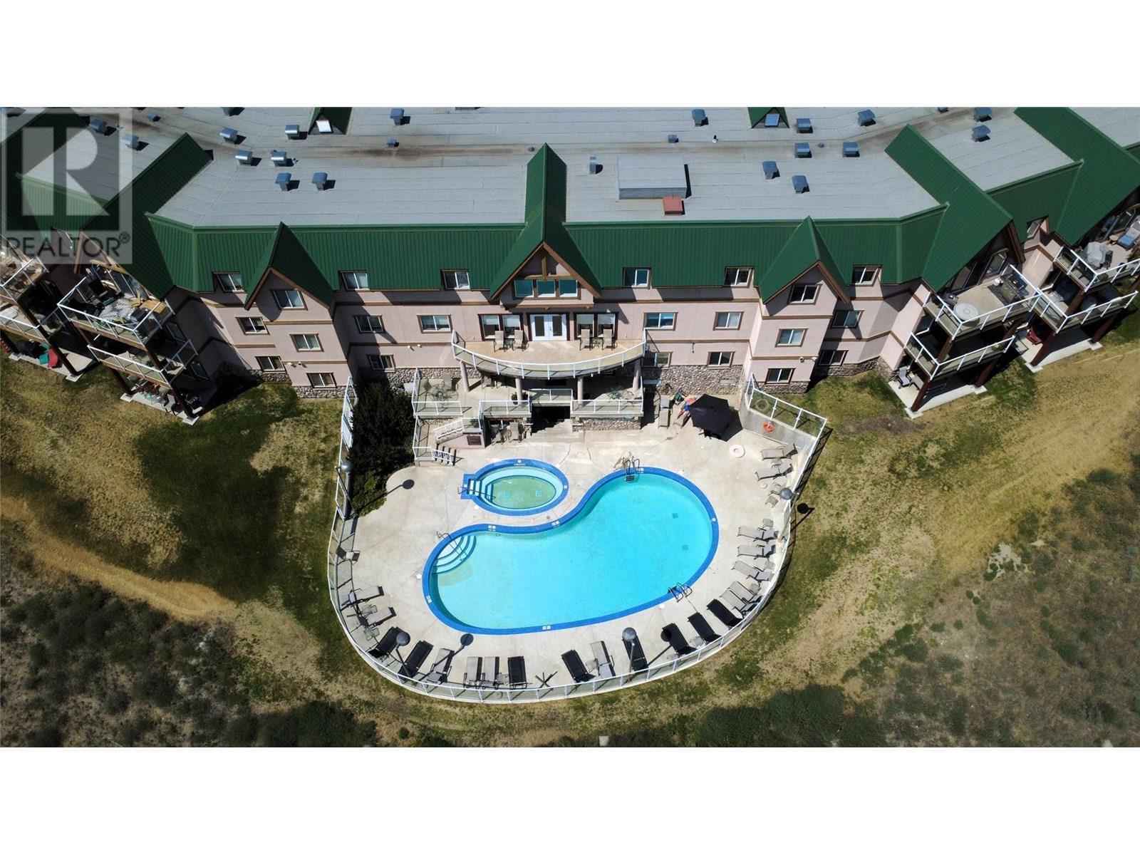 701 14A Crescent Unit# 213 I, Invermere, BC - Outdoor With In Ground Pool