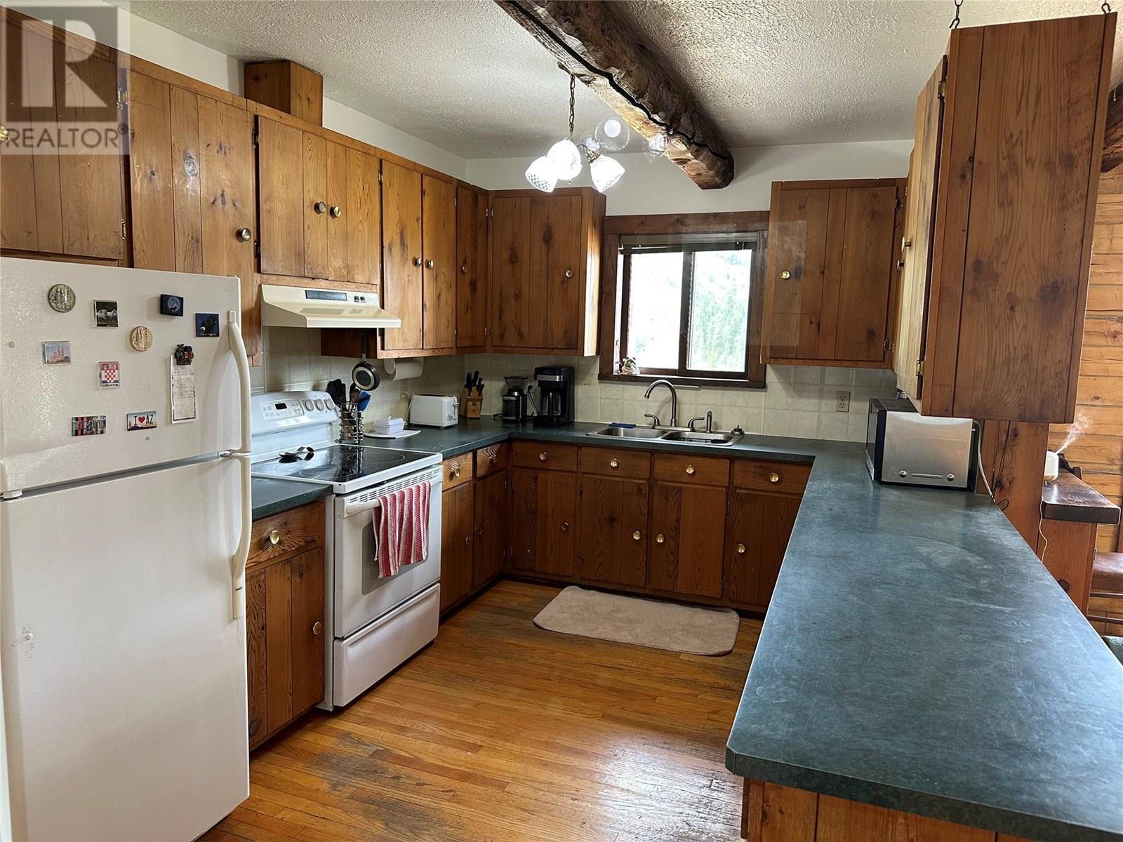 3655 Mclean Creek Road, Okanagan Falls, BC - Indoor Photo Showing Kitchen With Double Sink