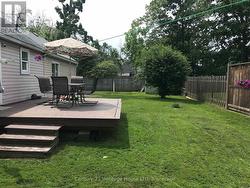fully fenced private back yard with deck -