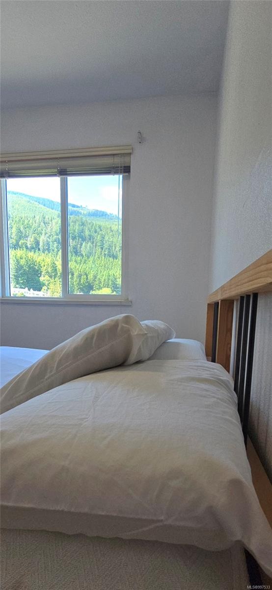 312-611 Macmillan Dr, Sayward, BC - Indoor Photo Showing Bedroom