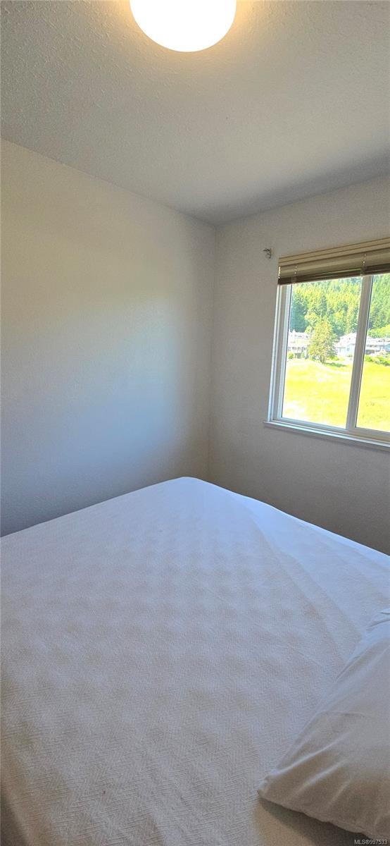 312-611 Macmillan Dr, Sayward, BC - Indoor Photo Showing Bedroom