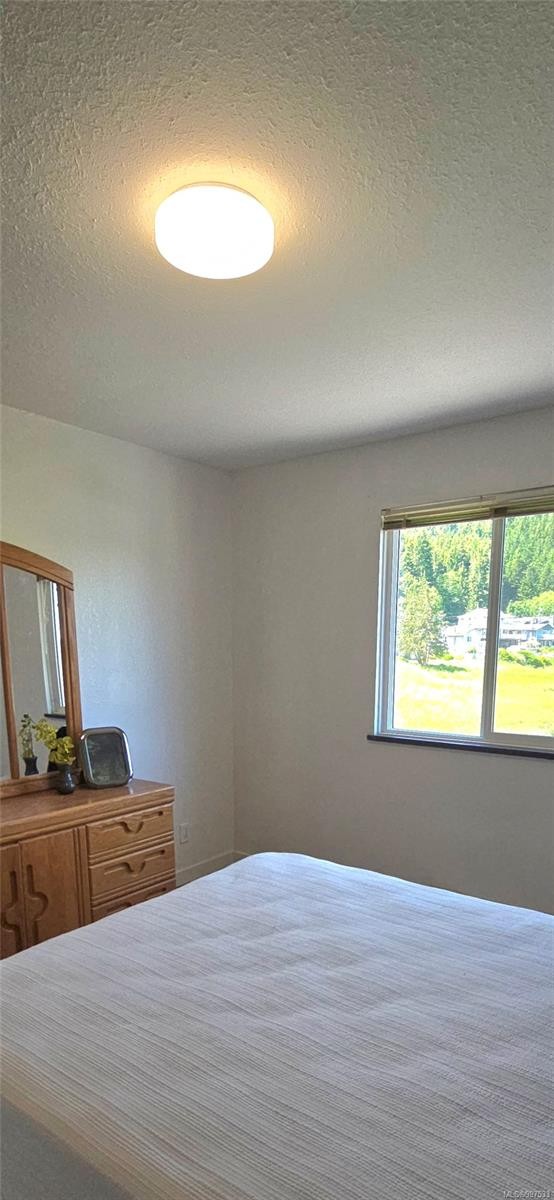 312-611 Macmillan Dr, Sayward, BC - Indoor Photo Showing Bedroom