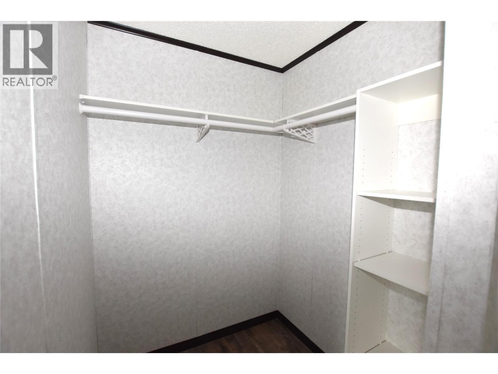 walk in closet with barn door - 61 Antoine Road Unit# 24, Vernon, BC