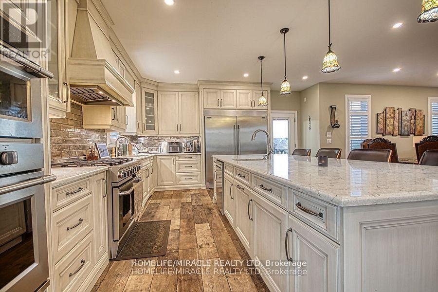 5499 Attema Crescent, West Lincoln, ON - Indoor Photo Showing Kitchen With Upgraded Kitchen