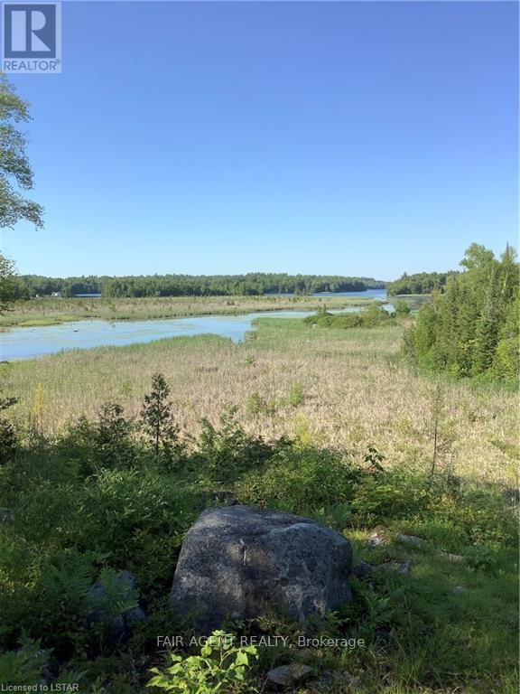 1165B Kirk Kove Road, Frontenac (Frontenac Centre), ON - Outdoor With Body Of Water With View