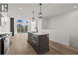 Kitchen. Photos taken from similar home in the community. -