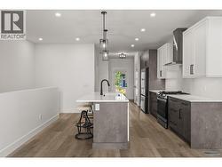 Kitchen. Photos taken from similar home in the community. -