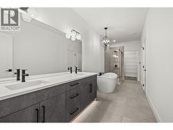 Ensuite. Photos taken from similar home in the community. -