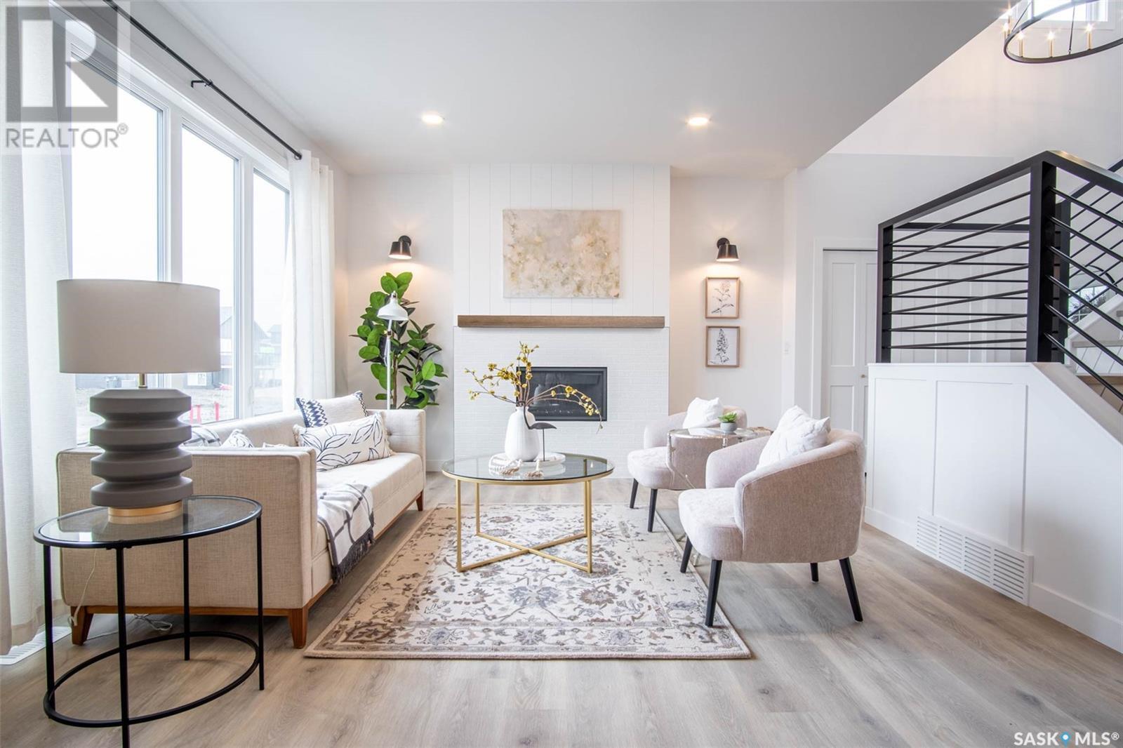 14 Sunterra Drive, Shields, SK - Indoor Photo Showing Living Room With Fireplace