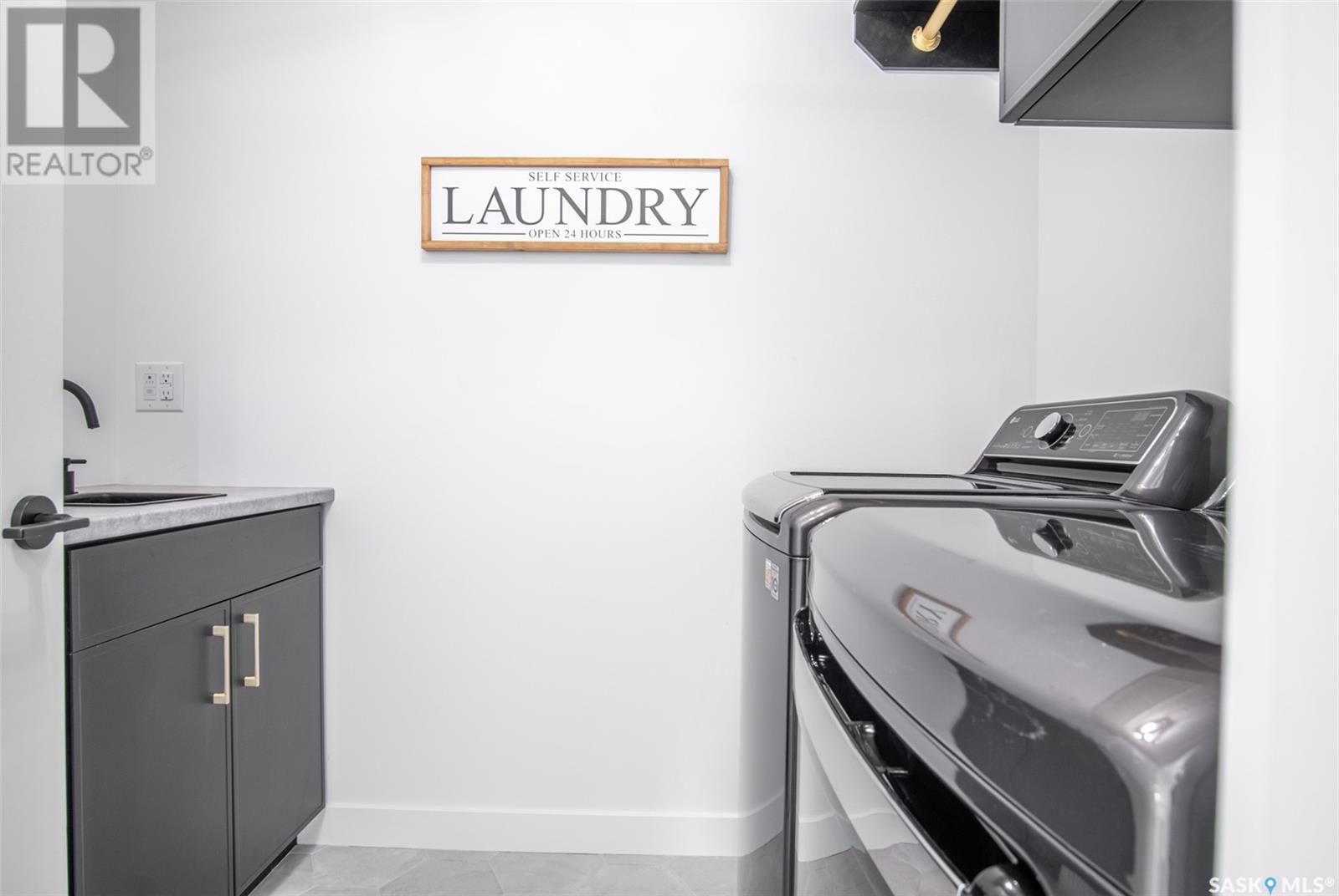 14 Sunterra Drive, Shields, SK - Indoor Photo Showing Laundry Room