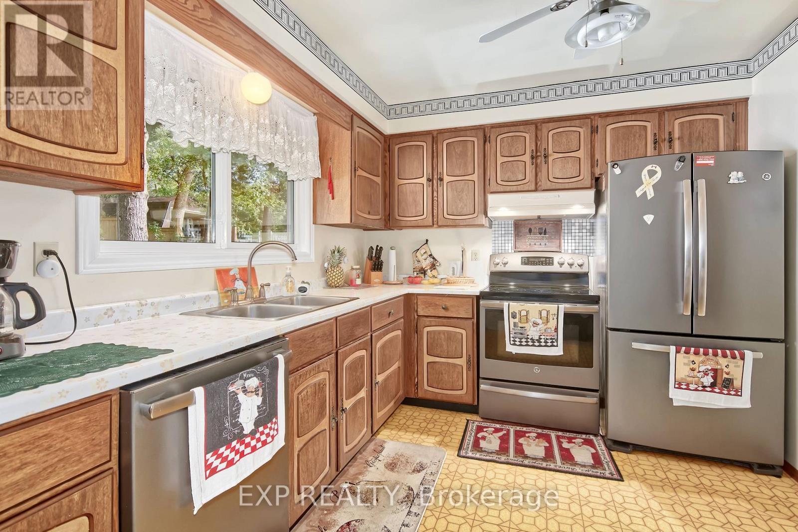 9995 Port Franks Estates Drive, Lambton Shores (Port Franks), ON - Indoor Photo Showing Kitchen With Stainless Steel Kitchen With Double Sink
