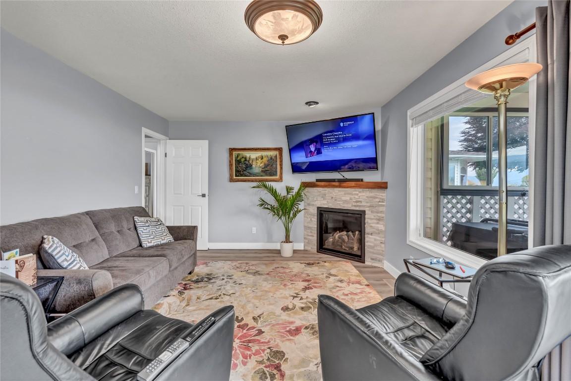 55 Kingfisher Drive, Penticton, BC - Indoor Photo Showing Living Room With Fireplace