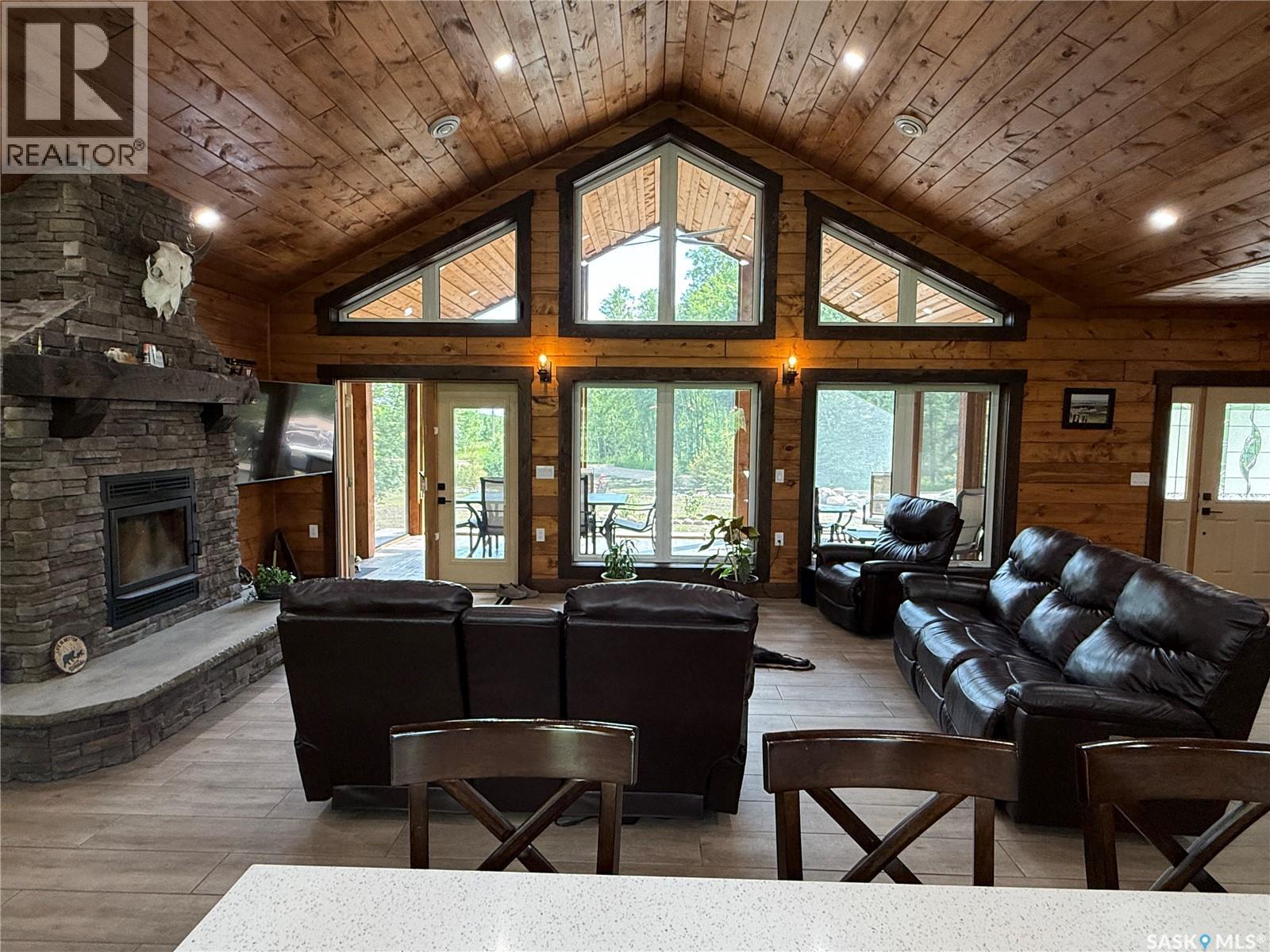 Dunham Acreage, Paddockwood Rm No. 520, SK - Indoor Photo Showing Living Room With Fireplace