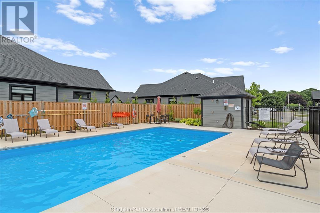 63 Compass Trail Unit# 35, Port Stanley, ON - Outdoor With In Ground Pool