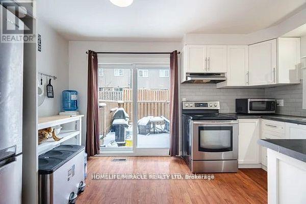 73 - 7080 Copenhagen Road, Mississauga, ON - Indoor Photo Showing Kitchen