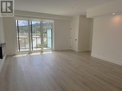 Living area with sliding doors to the 2nd patio on the mail level -