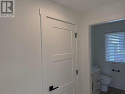 Pantry door and powder room on main level -