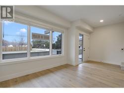 Large main level patio with over sized windows, and front entry. Gated front entrance patio is outside den/front entry. -