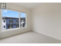 2nd Bedroom with oversized windows, blinds included. -