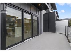 Patio with sliding doors off of the living area -