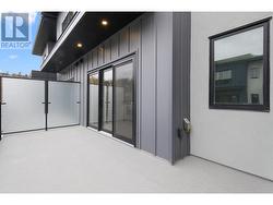 Patio with sliding doors off of the living area -