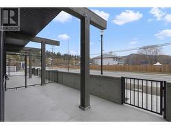 Entry level gated patio. Privacy glass is now installed between homes. -