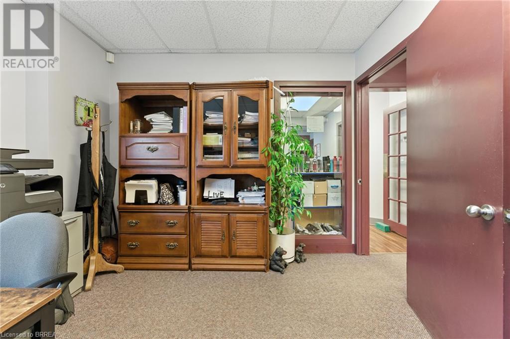 Office with carpet floors and a paneled ceiling - 207 Greenwich Street, Brantford, ON