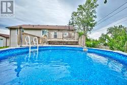 View of the pool and back of the house -