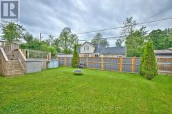 Large backyard partially-fenced in -