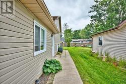 Side door and walkway to the house -