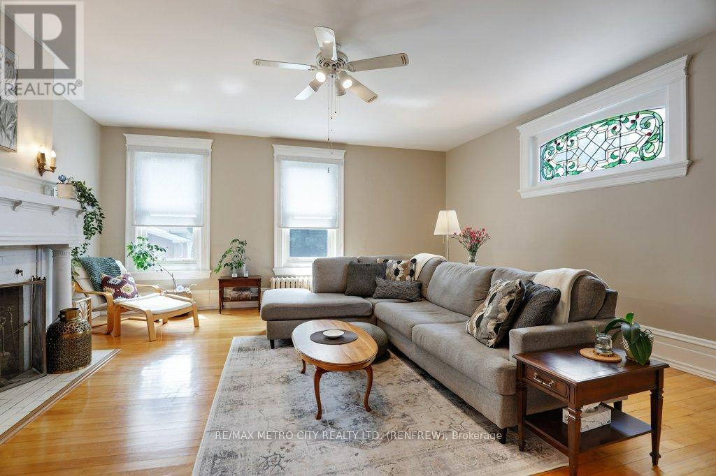 154 Quarry Avenue, Renfrew, ON - Indoor Photo Showing Living Room With Fireplace