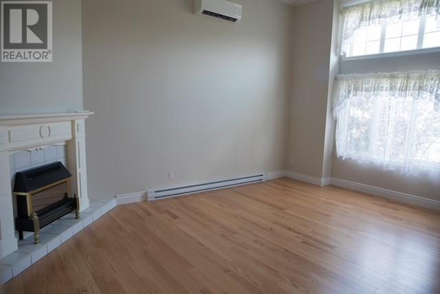 195 Road To The Isles Road, Lewisporte, NL - Indoor Photo Showing Other Room With Fireplace