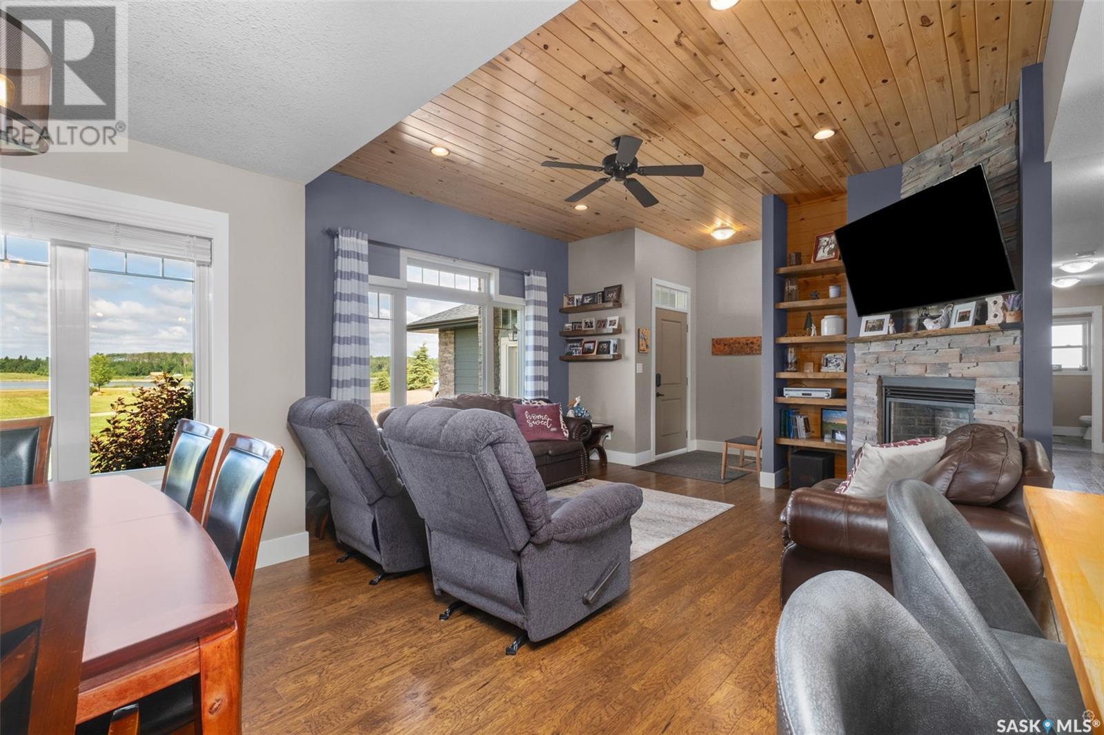 205 Aspen Cove, Paddockwood Rm No. 520, SK - Indoor Photo Showing Living Room With Fireplace