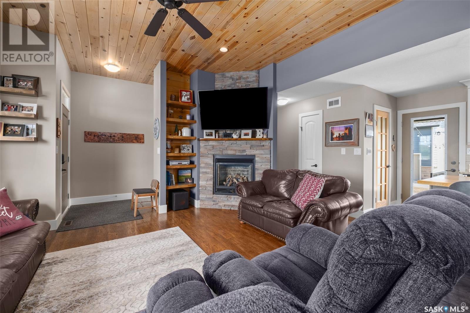 205 Aspen Cove, Paddockwood Rm No. 520, SK - Indoor Photo Showing Living Room With Fireplace