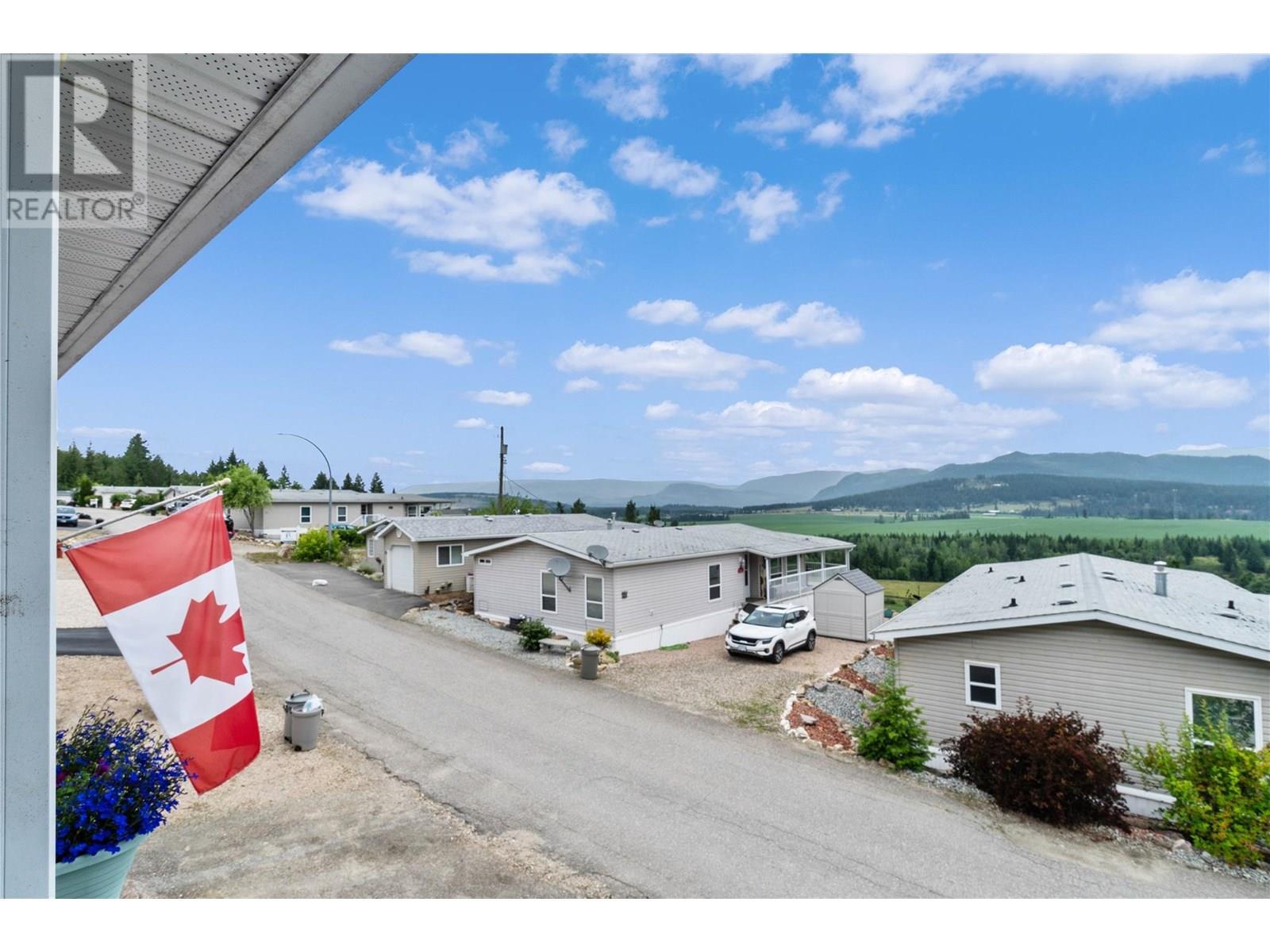 Deck view - 1885 Tappen Notch Hill Road Unit# 48, Tappen, BC