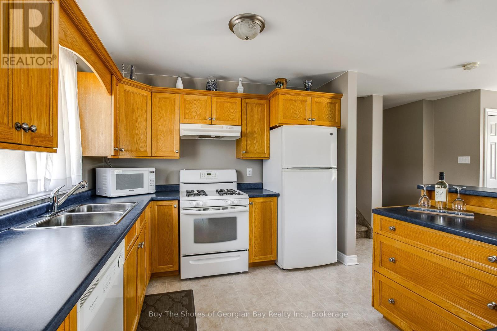 24 Marl Creek Drive, Springwater (Phelpston), ON - Indoor Photo Showing Kitchen With Double Sink