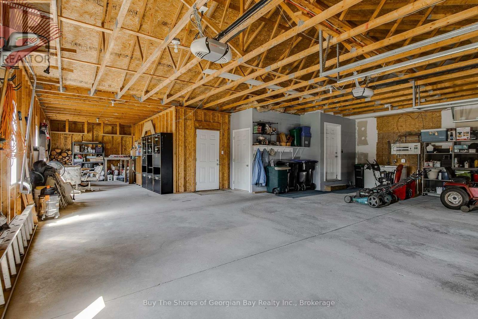24 Marl Creek Drive, Springwater (Phelpston), ON - Indoor Photo Showing Garage
