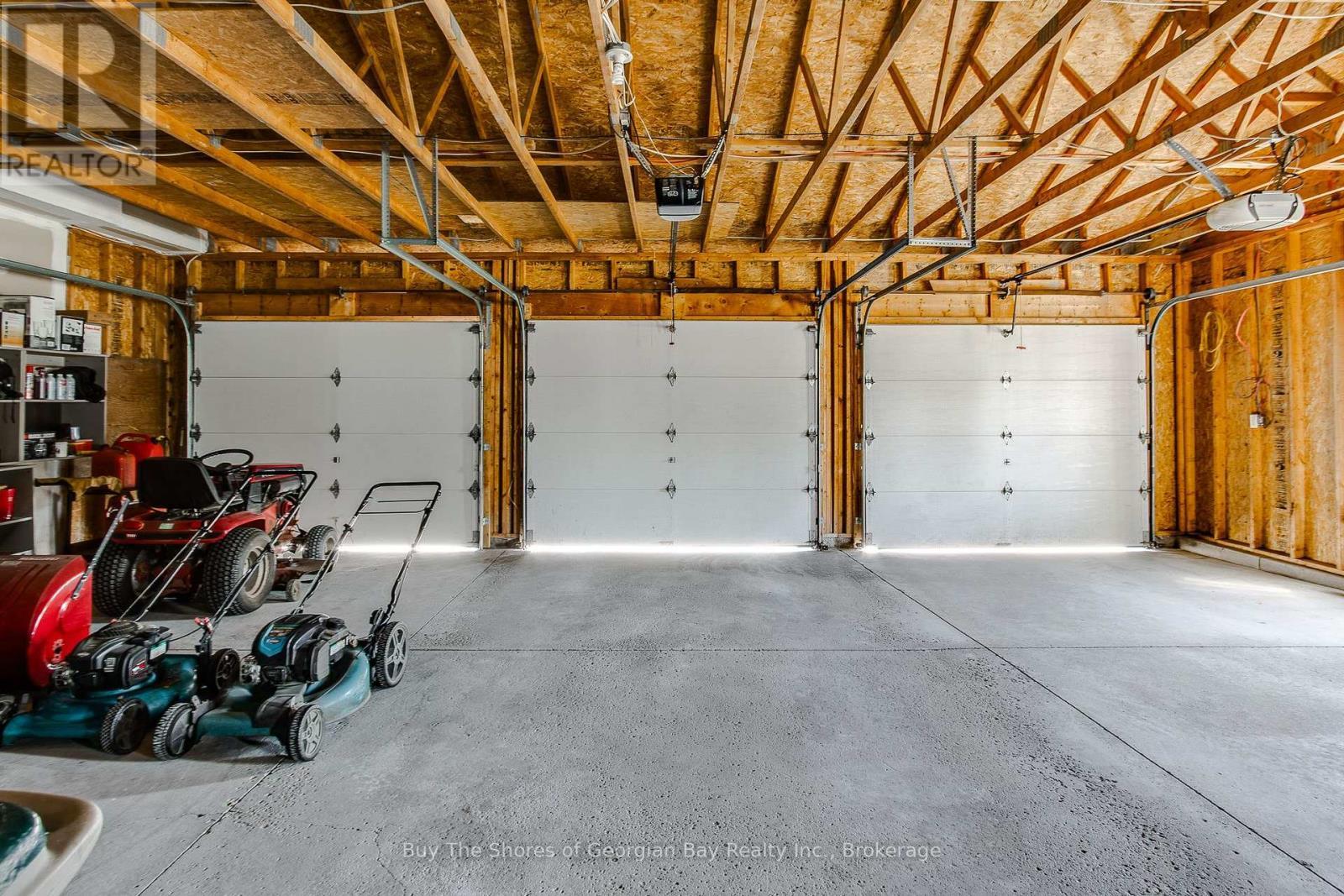 24 Marl Creek Drive, Springwater (Phelpston), ON - Indoor Photo Showing Garage