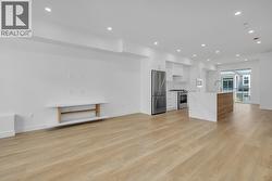 Luxury vinyl plank flooring - Photo of a similar home in the community. -