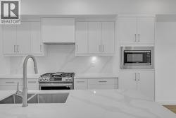 Top-of-the-line wi-fi-enabled Samsung appliances - Photo of a similar home in the community. -