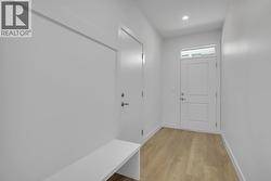 Rear laneway access - Photo of a similar home in the community. -