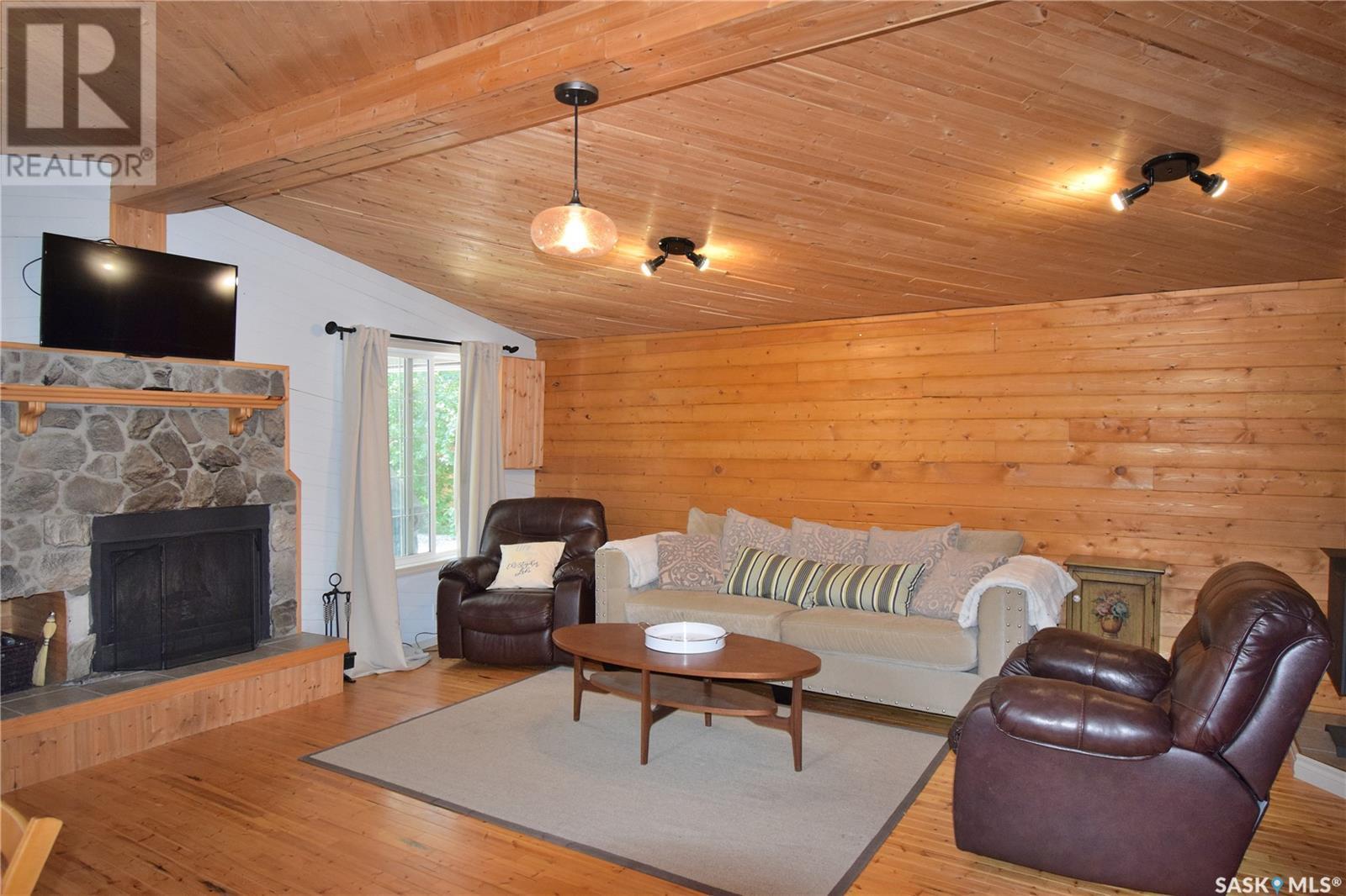 207 Jacobson Drive, Lakeland Rm No. 521, SK - Indoor Photo Showing Living Room With Fireplace