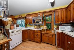 Kitchen Overlooks Easting Area -