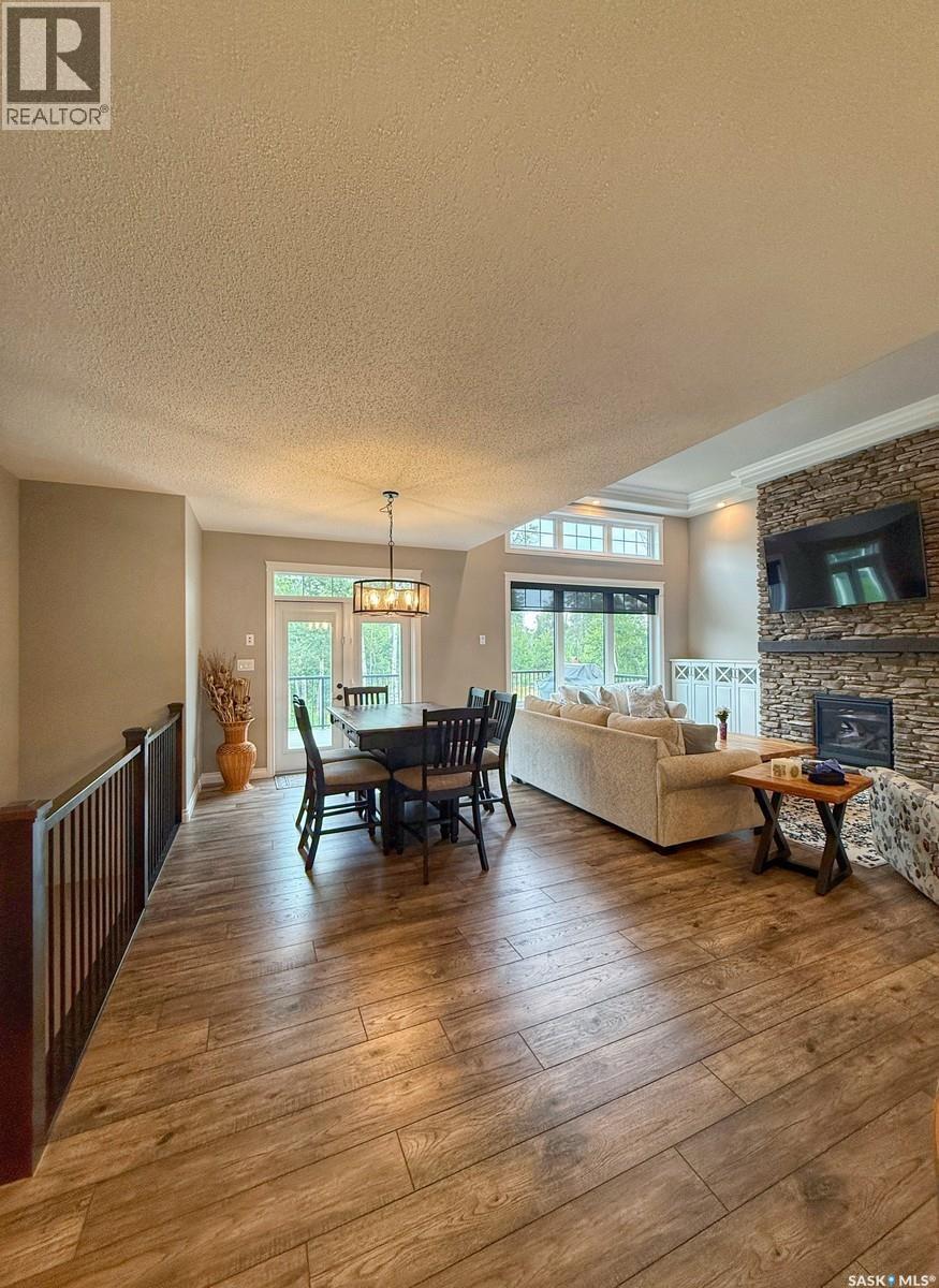 214 Hillside Drive, Tobin Lake, SK - Indoor Photo Showing Living Room With Fireplace
