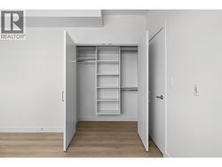 Large closet space in second bedroom, with built-in shelving. -