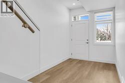 Lower level entry. Photo of a similar home in the community. -