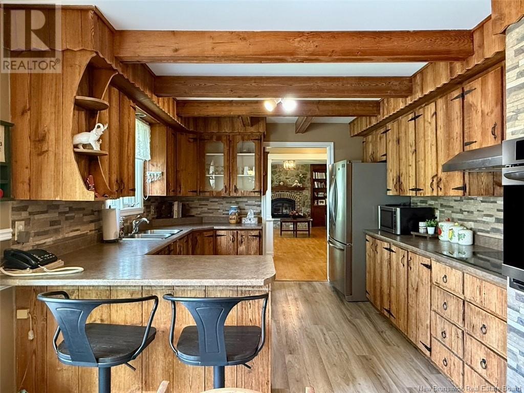25 Arseneault Street, Balmoral, NB - Indoor Photo Showing Kitchen With Double Sink